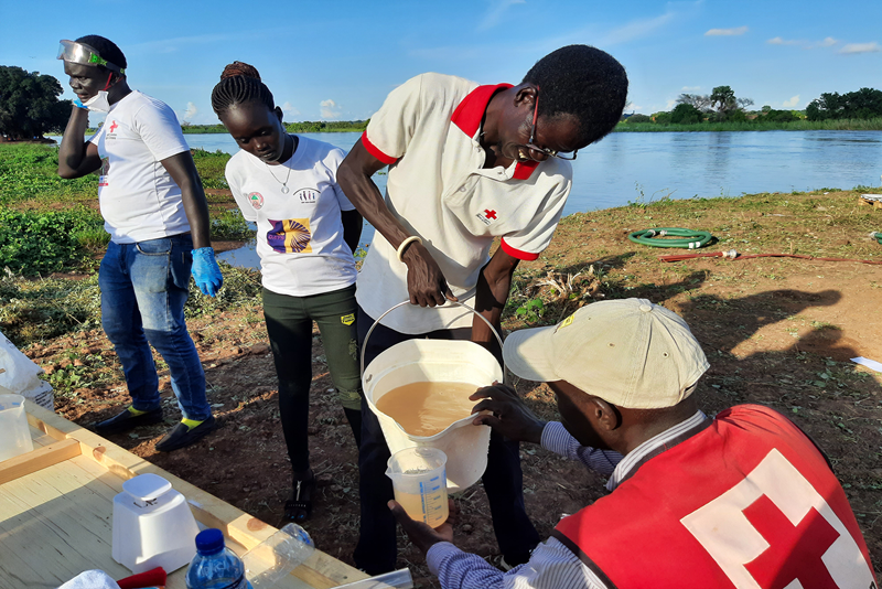 The photograph shows South Sudan Red Cross volunteers or staff as participants in an emergency WaSH training that Derrick Agaba Muhumuza (and Rendal Gideon Allan) was involved in facilitating.